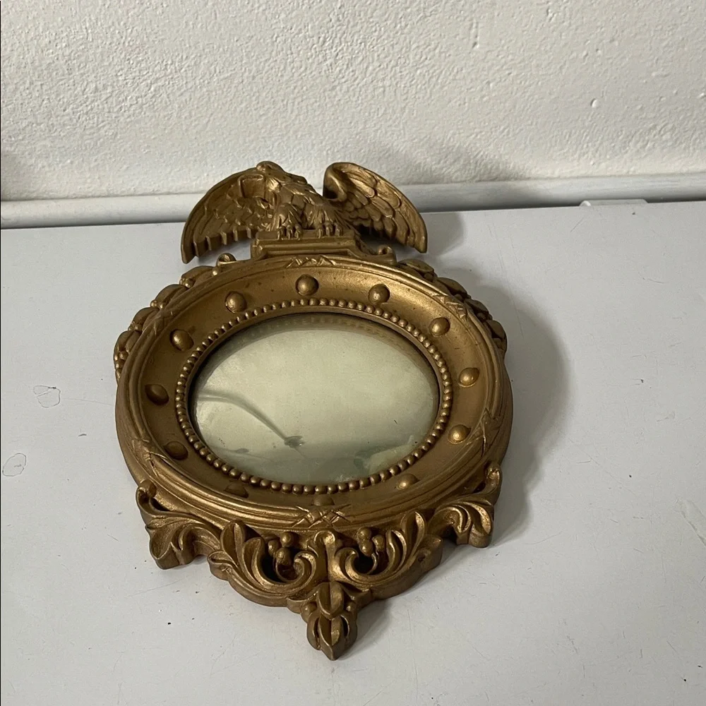 Vintage antique SYROCO gold American Eagle convex mirror.